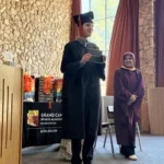 Student graduates from GCPA, instead of a traditional high school